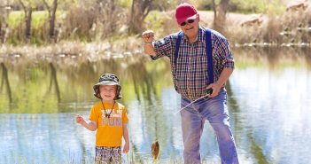 grandfather and grandson fishing image
