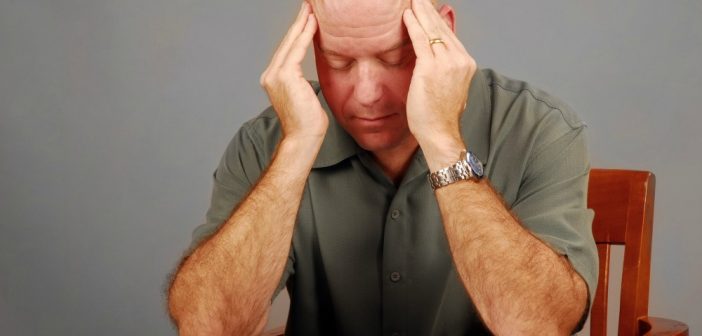 Man suffering from headache